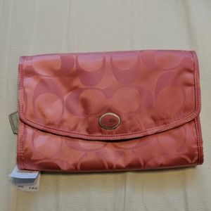 NWT Coach make up bag/travel bag in coral